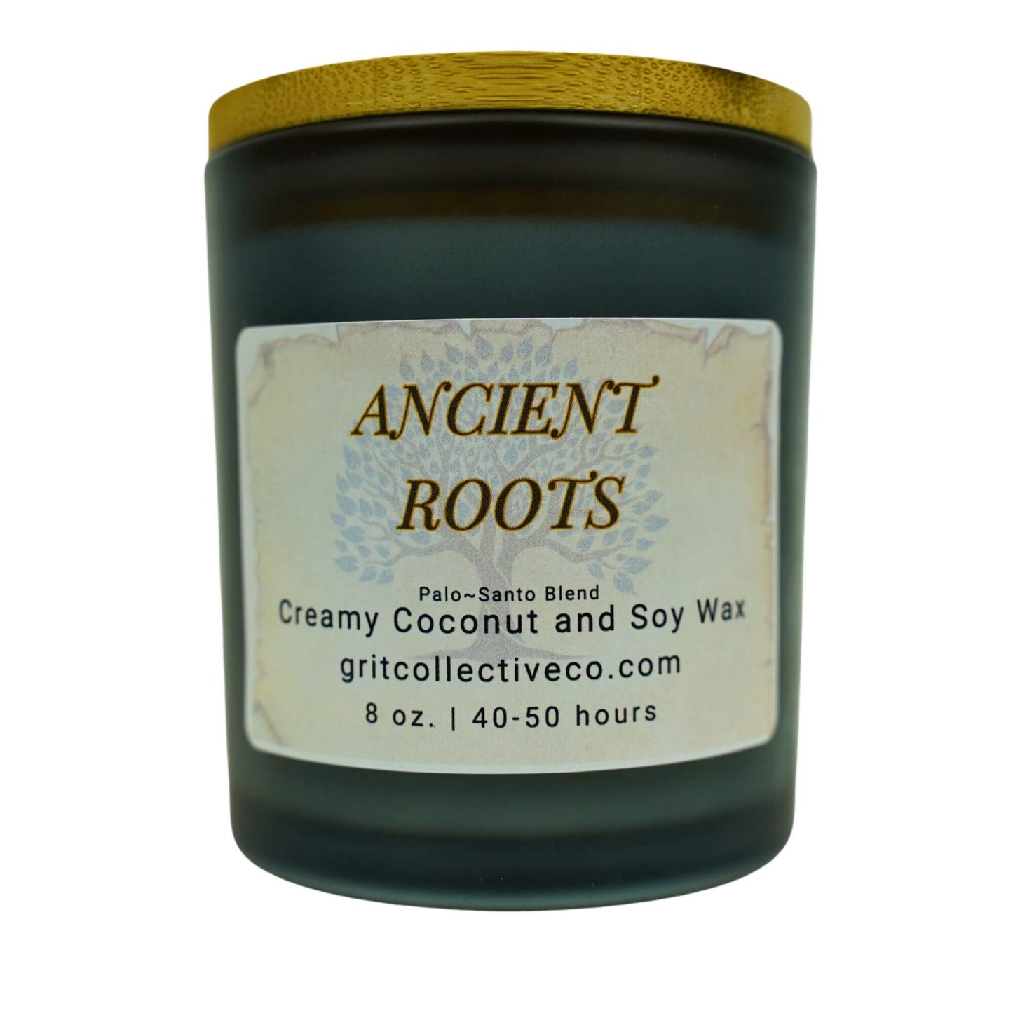Ancient Roots" Palo Santo blend creamy coconut and soy wax candle by Grit Collective Co. featuring a tree design and wooden lid.