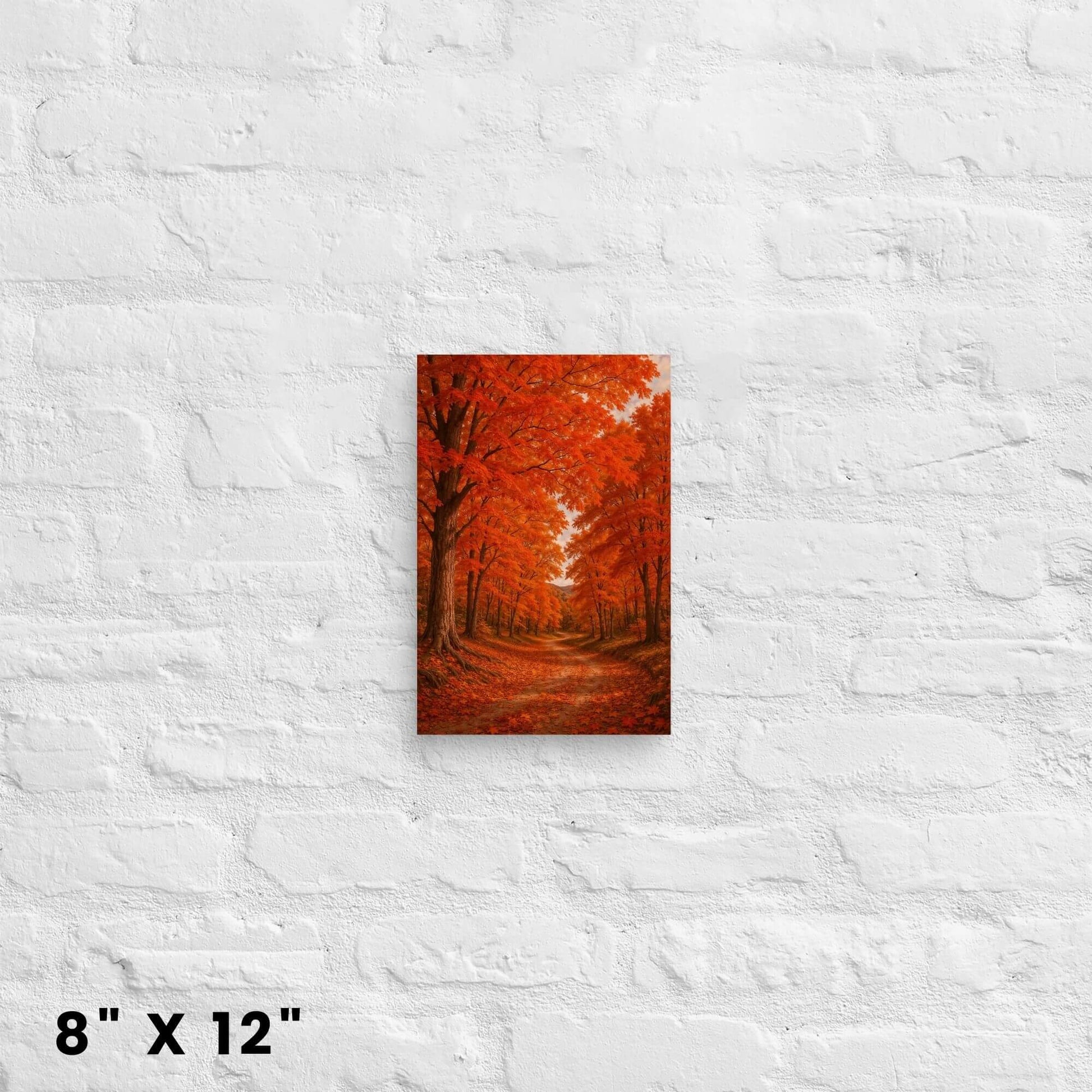 8 × 12-inch mini autumn forest canvas accent showcasing fiery orange leaves and rustic trail against a white-brick backdrop.