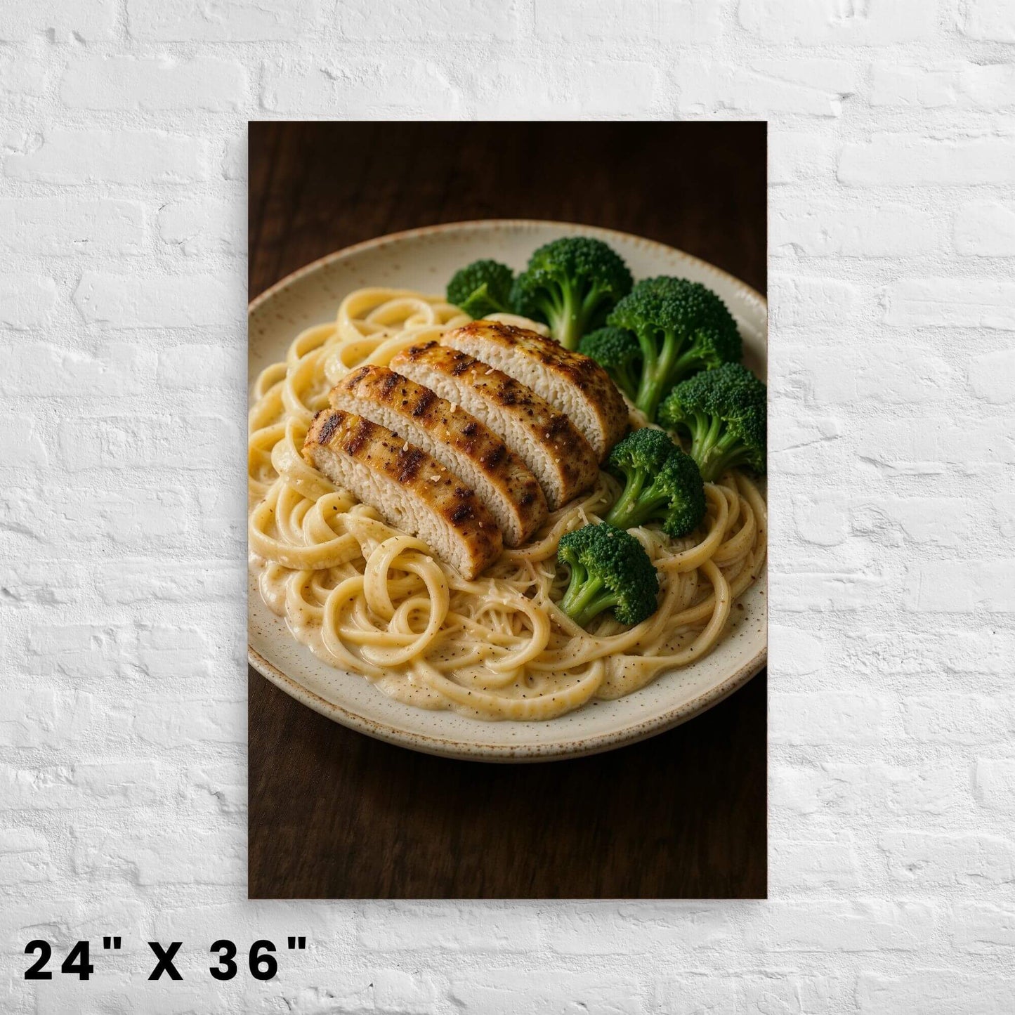 24"x36" canvas print depicting delicious chicken Alfredo pasta with broccoli, mounted on a
white brick wall.