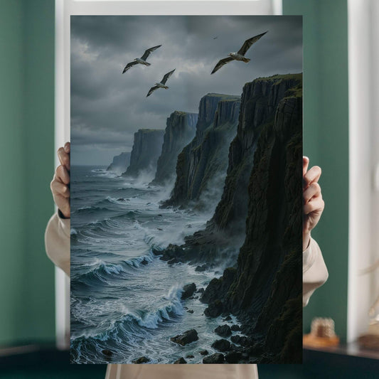 Person holding a canvas print of a dramatic coastal scene with cliffs, crashing waves, and seagulls.