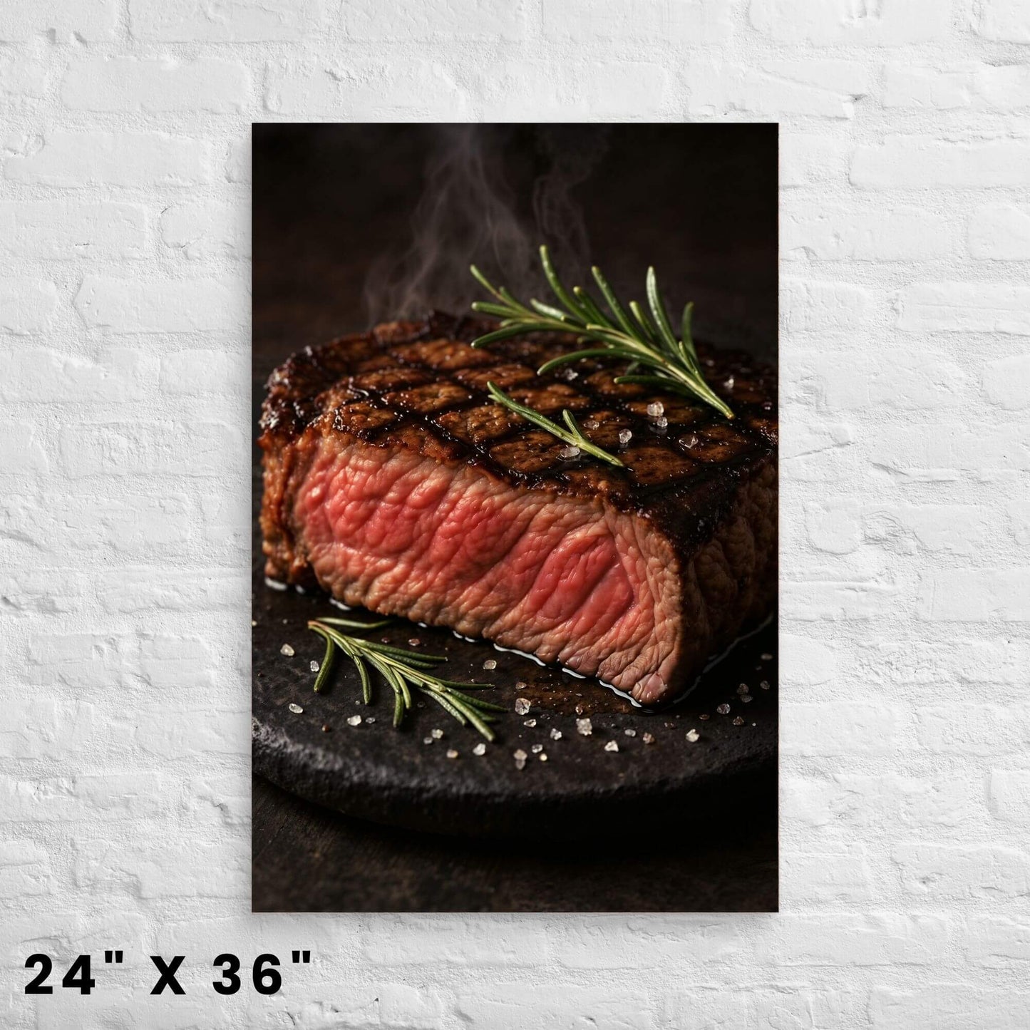 24 × 36-inch juicy grilled steak canvas print with rosemary sprigs and sea salt, showcased on a crisp white-brick wall.