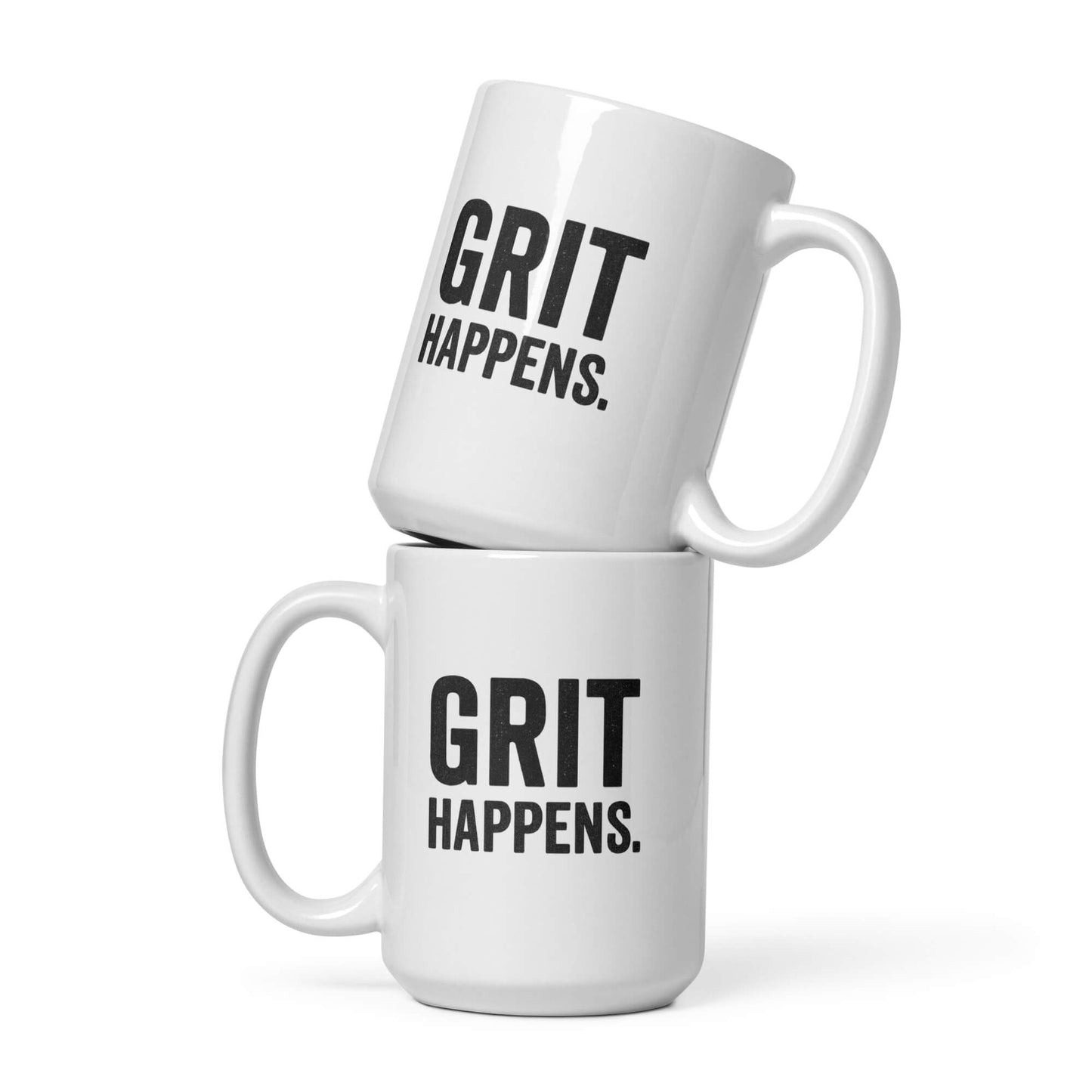 Two 15oz white ceramic mugs with the "Grit Happens" design by Grit Collective, one stacked on top of the other.