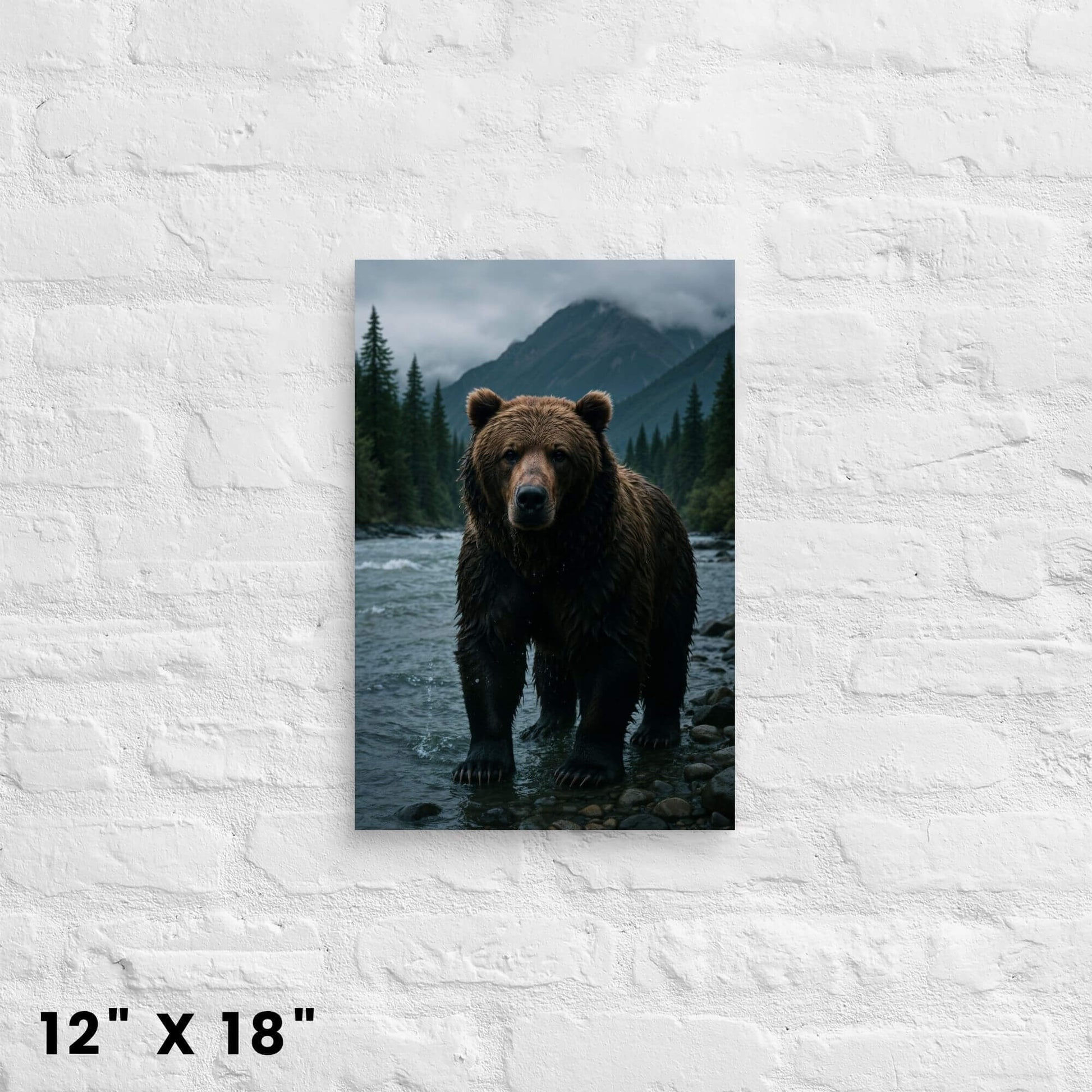 12 × 18-inch grizzly bear in forested river valley canvas wall art accent for nature lovers, shown on white-brick wall.