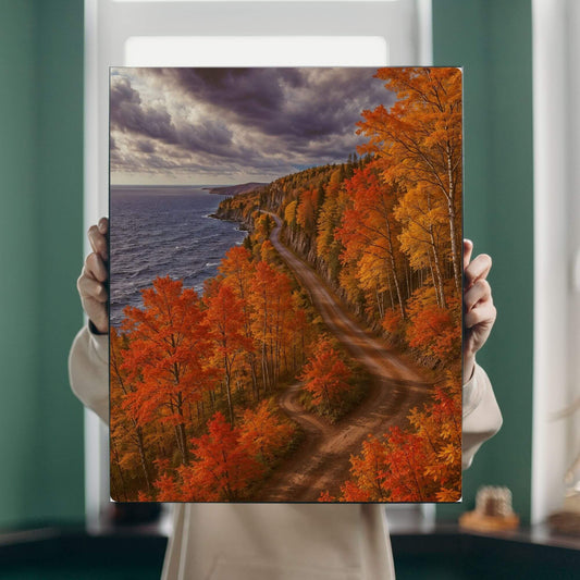 Canvas print of a winding road through vibrant fall colors on the Minnesota North Shore overlooking Lake Superior under a dramatic sky.