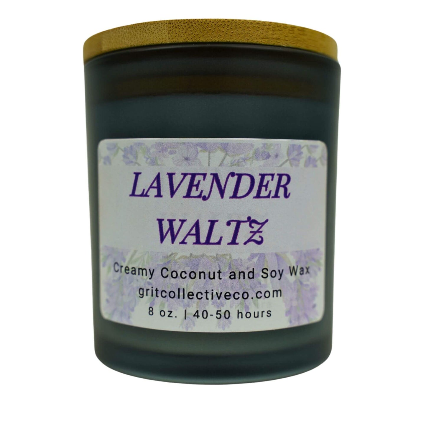Lavender Waltz" creamy coconut and soy wax candle by Grit Collective Co. featuring a lavender floral design and wooden lid.