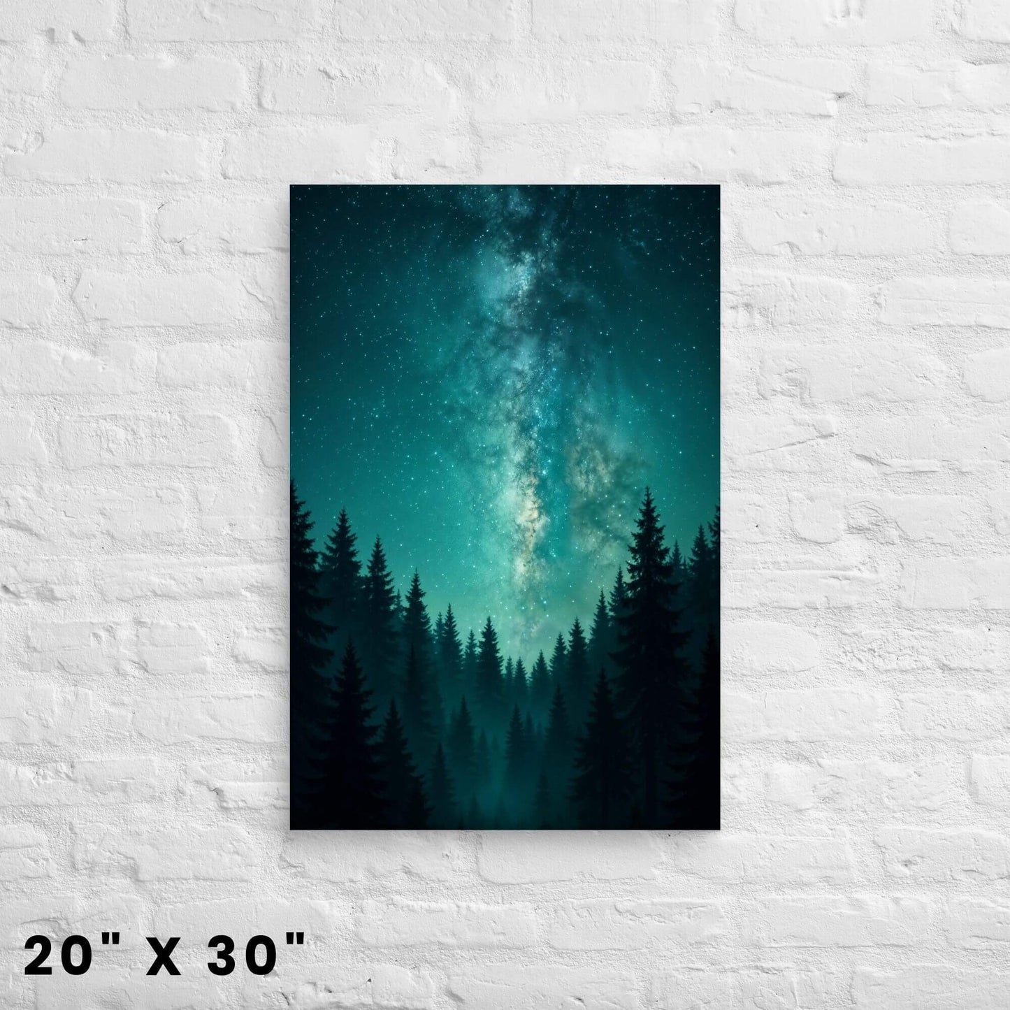 20 × 30 in. teal Milky Way and
evergreen forest canvas print hanging on a white brick wall