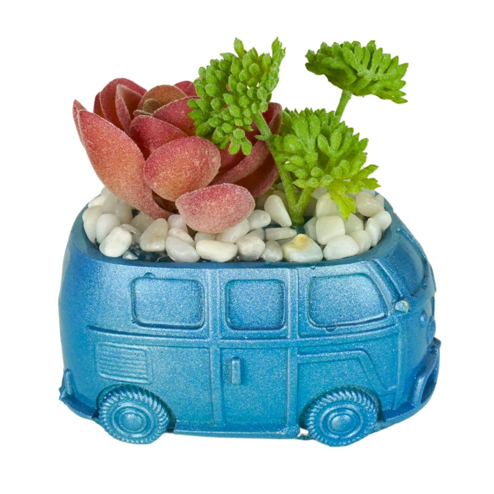 Unique handmade mini retro bus concrete planter in metallic blue with a combination of reddish-pink and green artificial succulents and white pebbles.