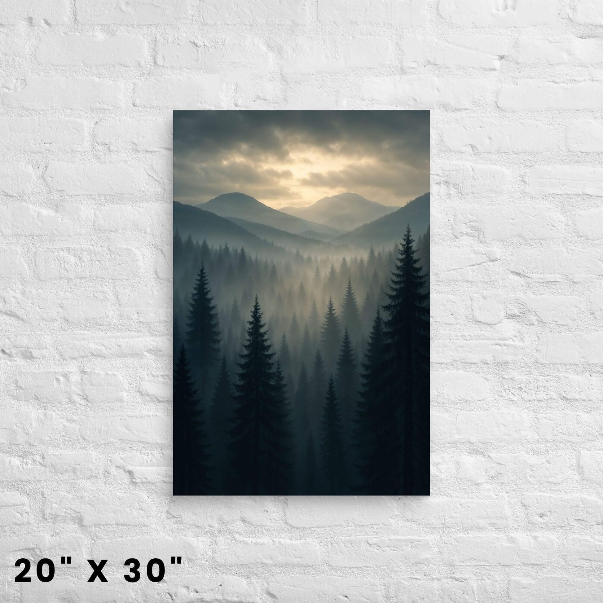 20 × 30-inch foggy evergreen-valley and layered-ridge canvas wall art in dramatic twilight hues on a clean white-brick backdrop.