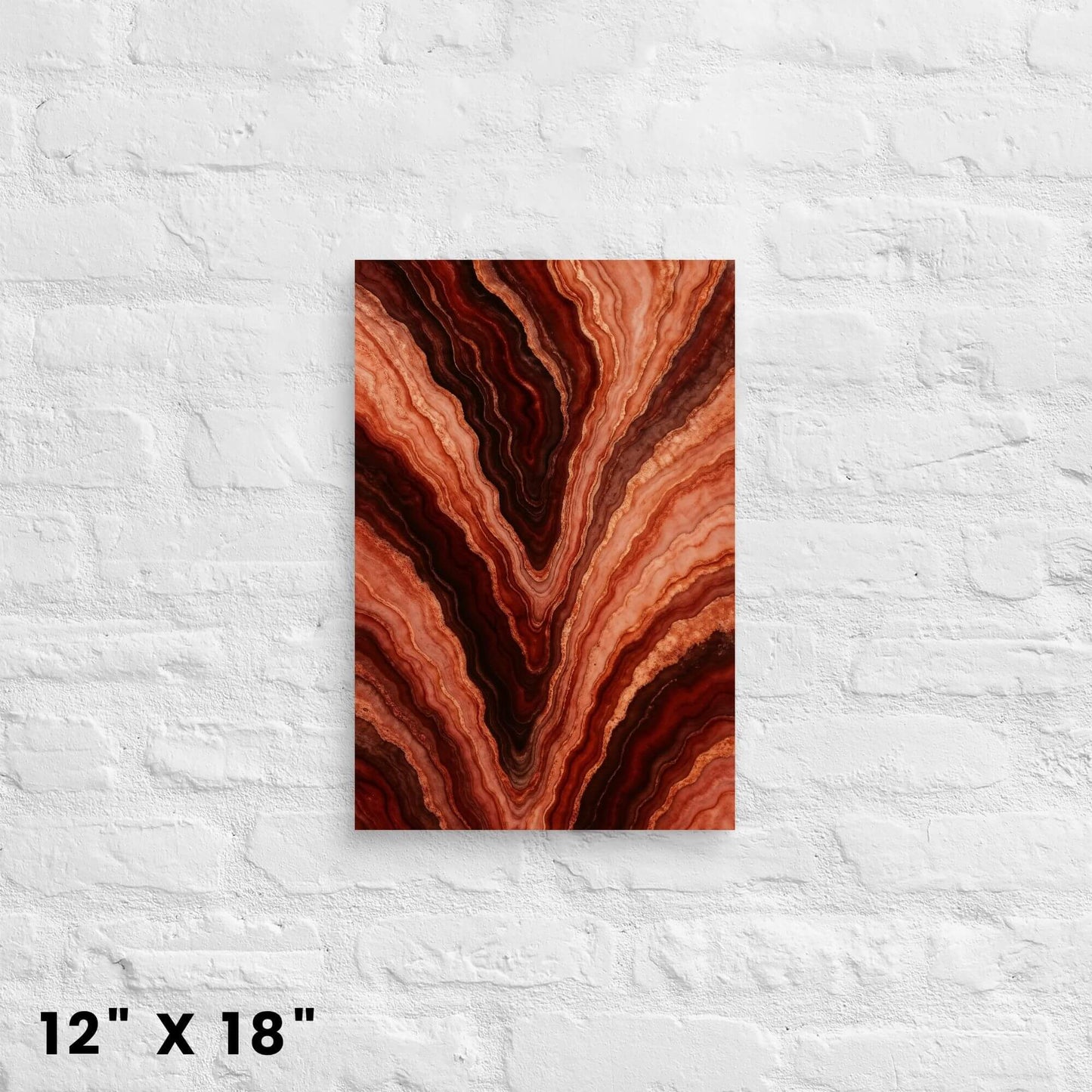 12 × 18-inch red-ochre agate-band abstract wall art adding vibrant mineral texture to a white-brick wall.