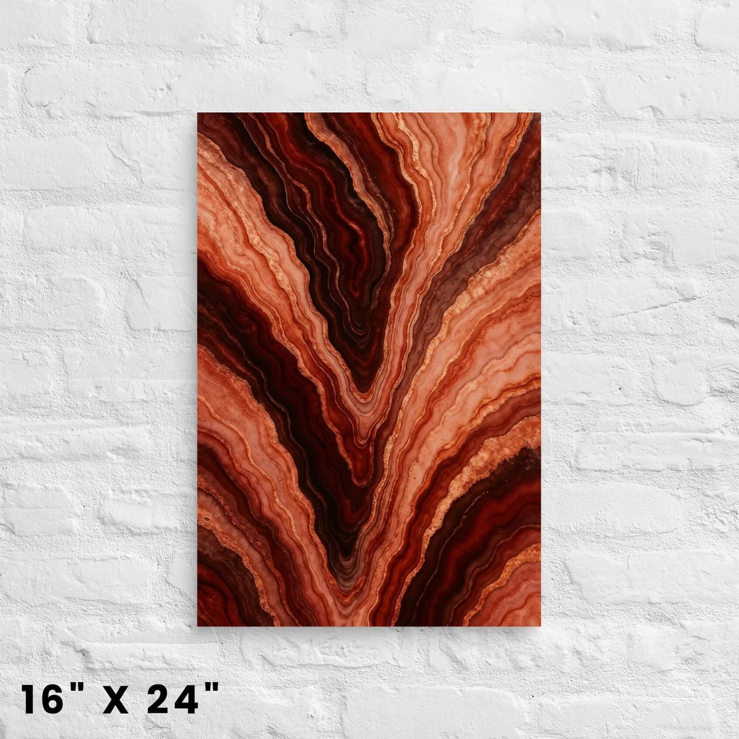 16 × 24-inch copper-hued agate-slice canvas print revealing intricate geological layers, hung on a white-brick setting.