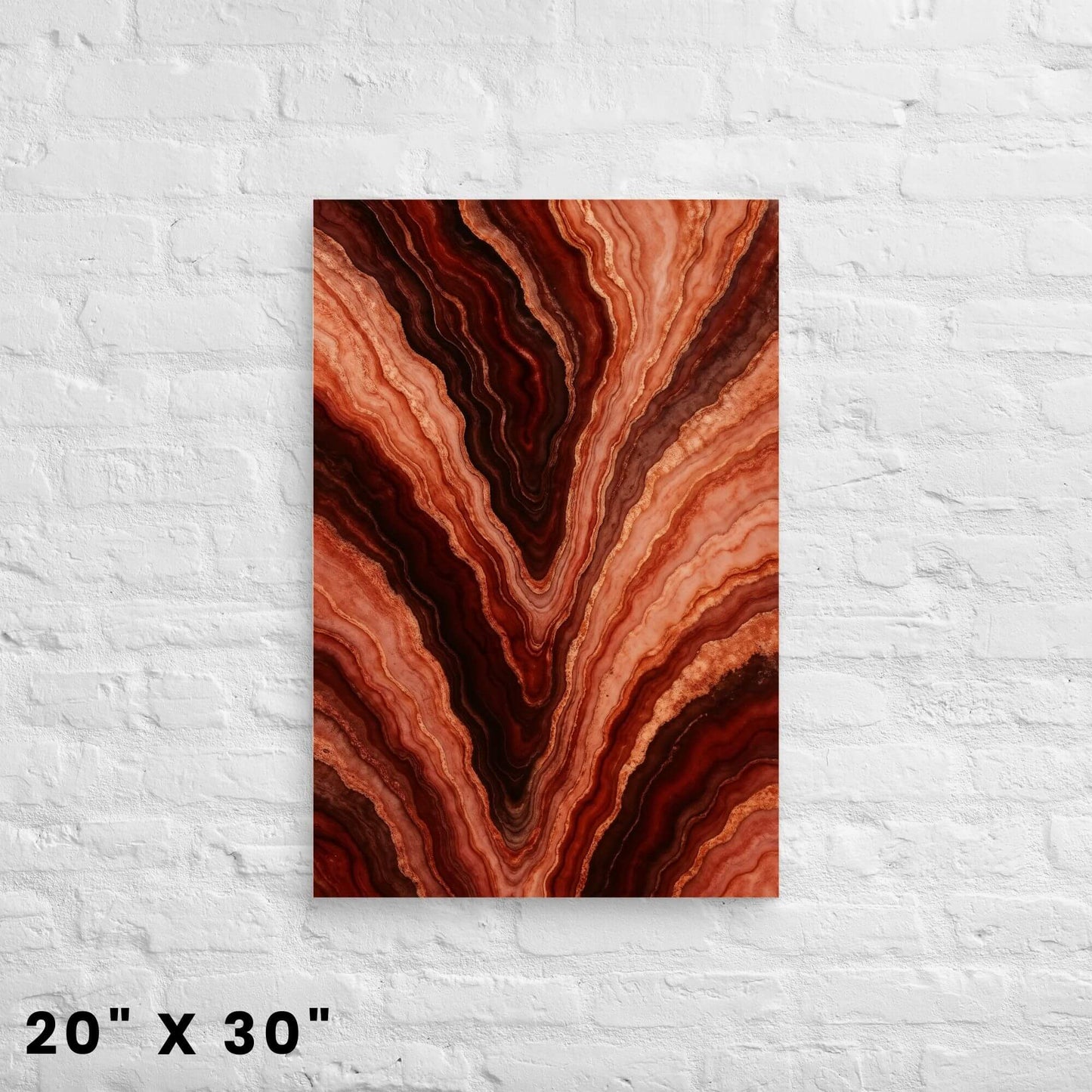 20 × 30-inch layered agate-striation abstract wall art in fiery earth tones, mounted against a clean white-brick backdrop.