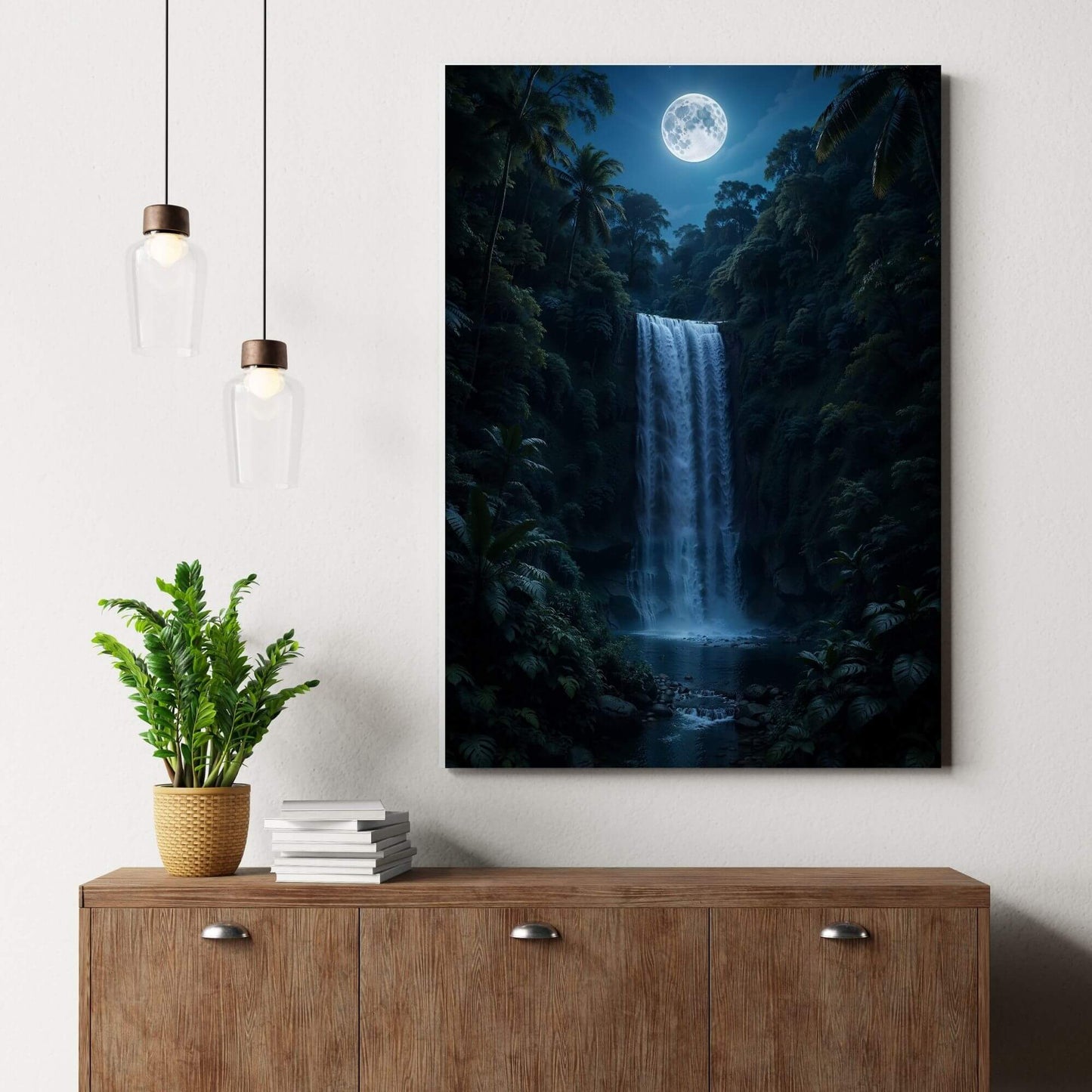 Moonlit waterfall canvas wall art adding calming nocturnal ambiance above a modern wood sideboard with pendant lights and greenery.