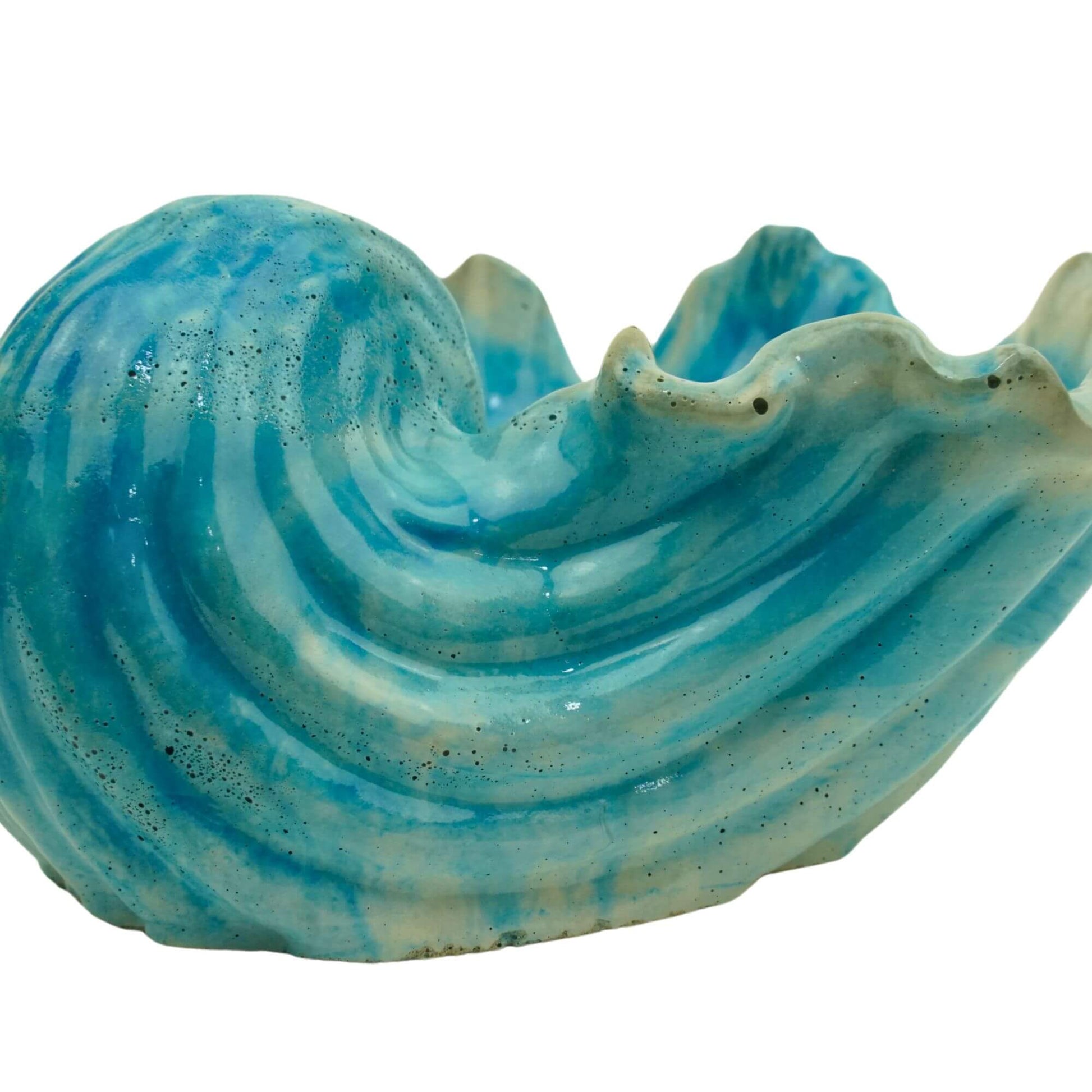 Close-up detail of the blue and concrete swirl pattern on a handcrafted Ocean Bowl.