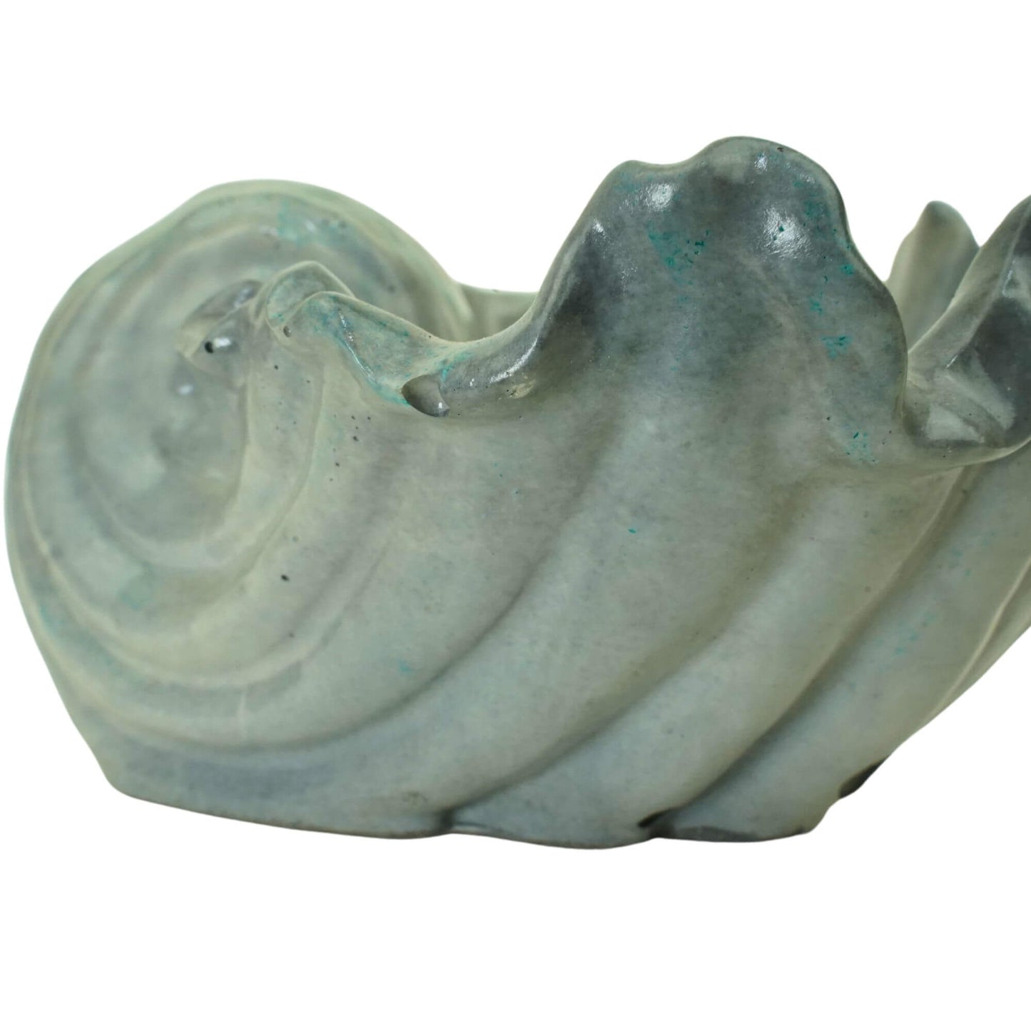 Close-up detail of the swirl pattern on a gray or blue tide handcrafted concrete Ocean Bowl.