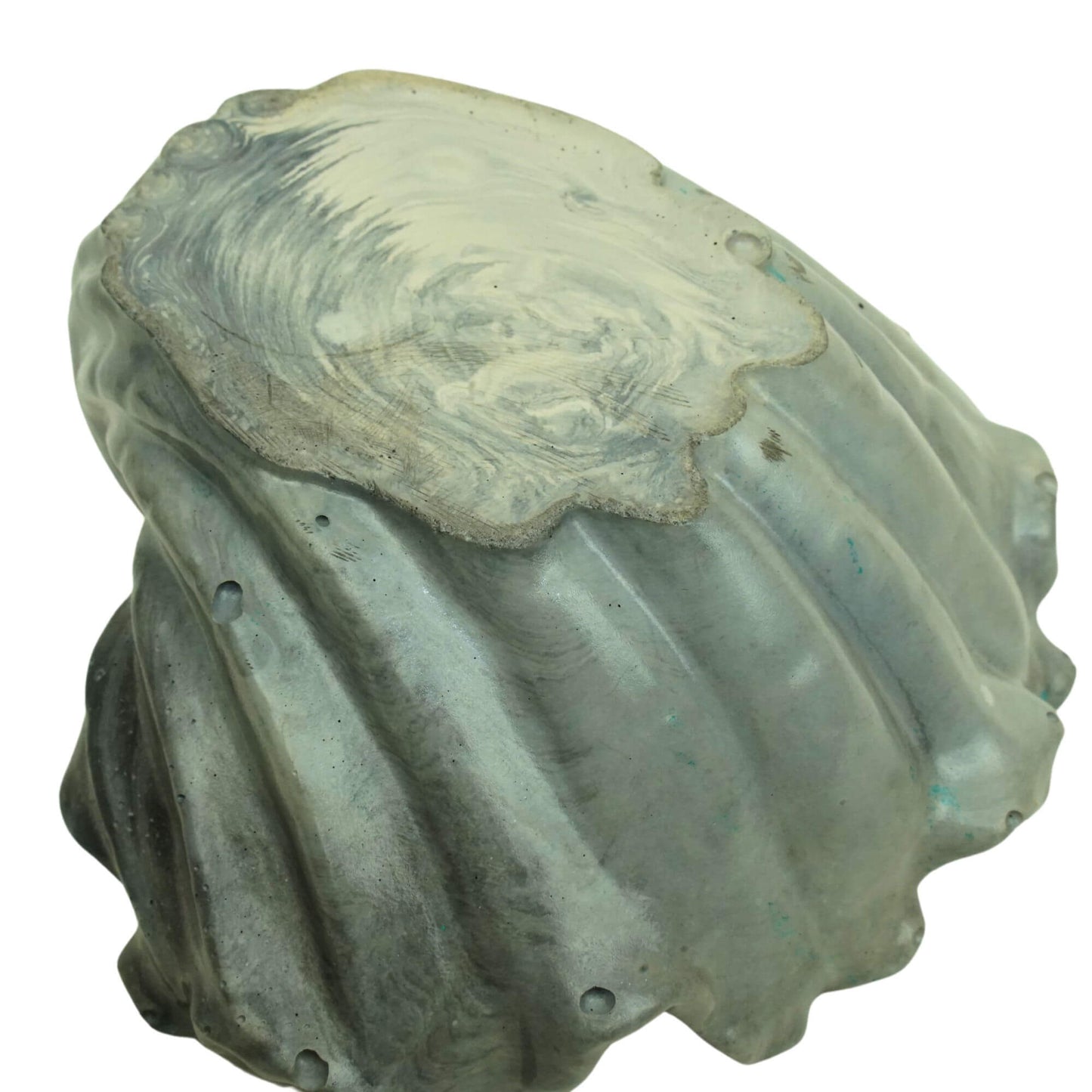 Bottom and side view of a gray or lavender tide Ocean Bowl, highlighting the handcrafted concrete texture.