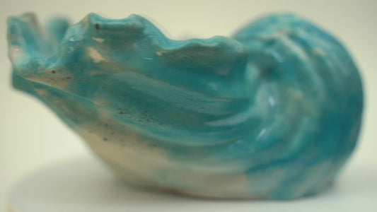 Single handcrafted concrete Ocean Bowl in a blue and black swirl color, a coastal charm dish.Single handcrafted concrete Ocean Bowl in a green and black swirl color, a coastal charm dish.