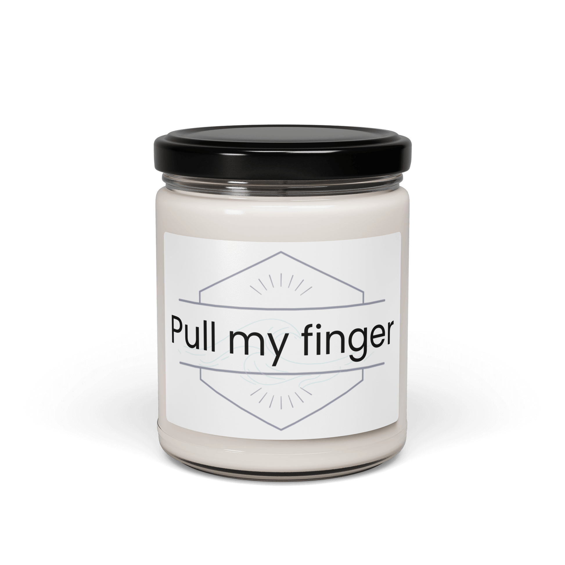 Pull my finger" scented candle with black lid on a black background.