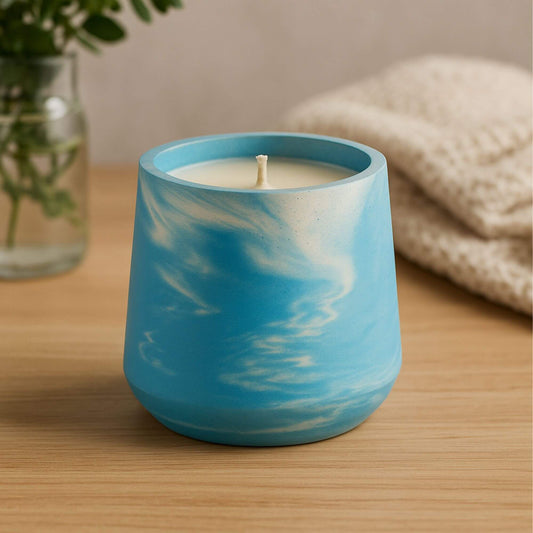 Dark swirl marble Sea Stone Concrete Candle by Grit Collective, a 6oz hand-poured coconut-soy wax candle in a unique artisan vessel.
