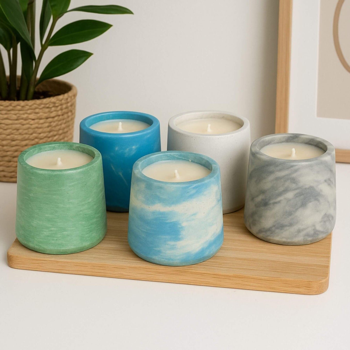 Vibrant blue marble Sea Stone Concrete Candle by Grit Collective, a 6oz hand-poured coconut-soy wax candle with a captivating deep blue swirl design.