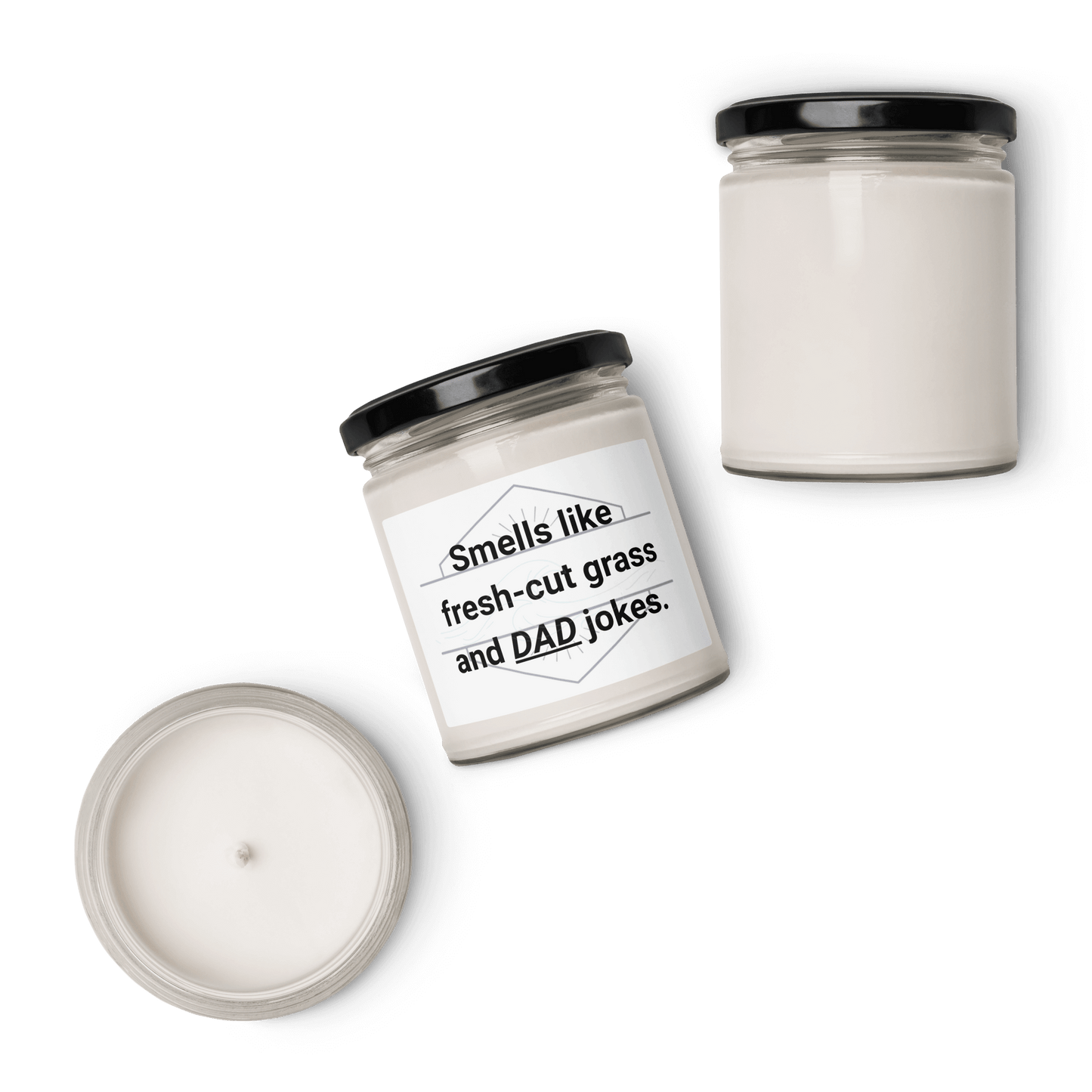Multiple views (front, top, side) of the "Smells like fresh-cut grass and DAD jokes" candle on a black background.