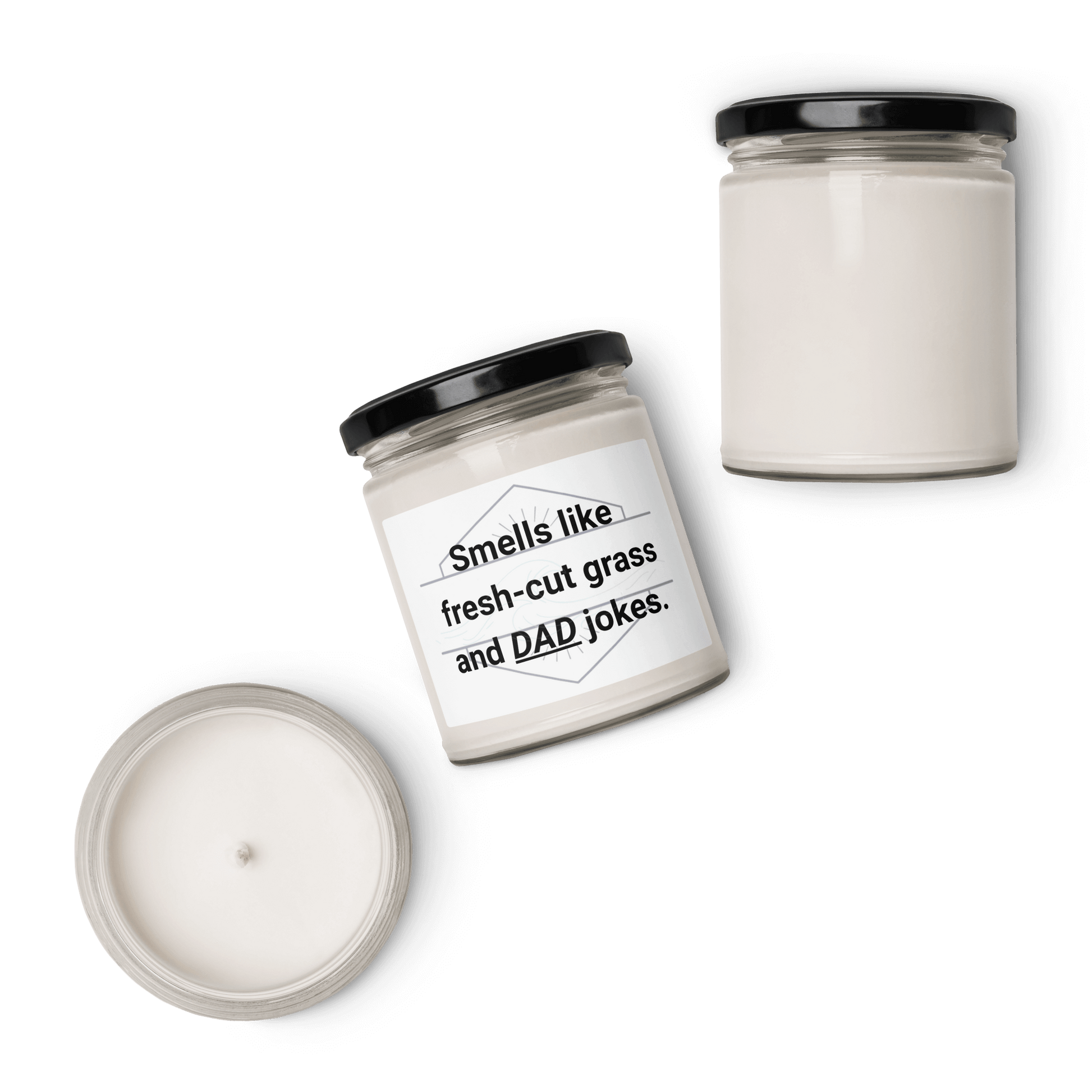 Multiple views (front, top, side) of the "Smells like fresh-cut grass and DAD jokes" candle on a black background.