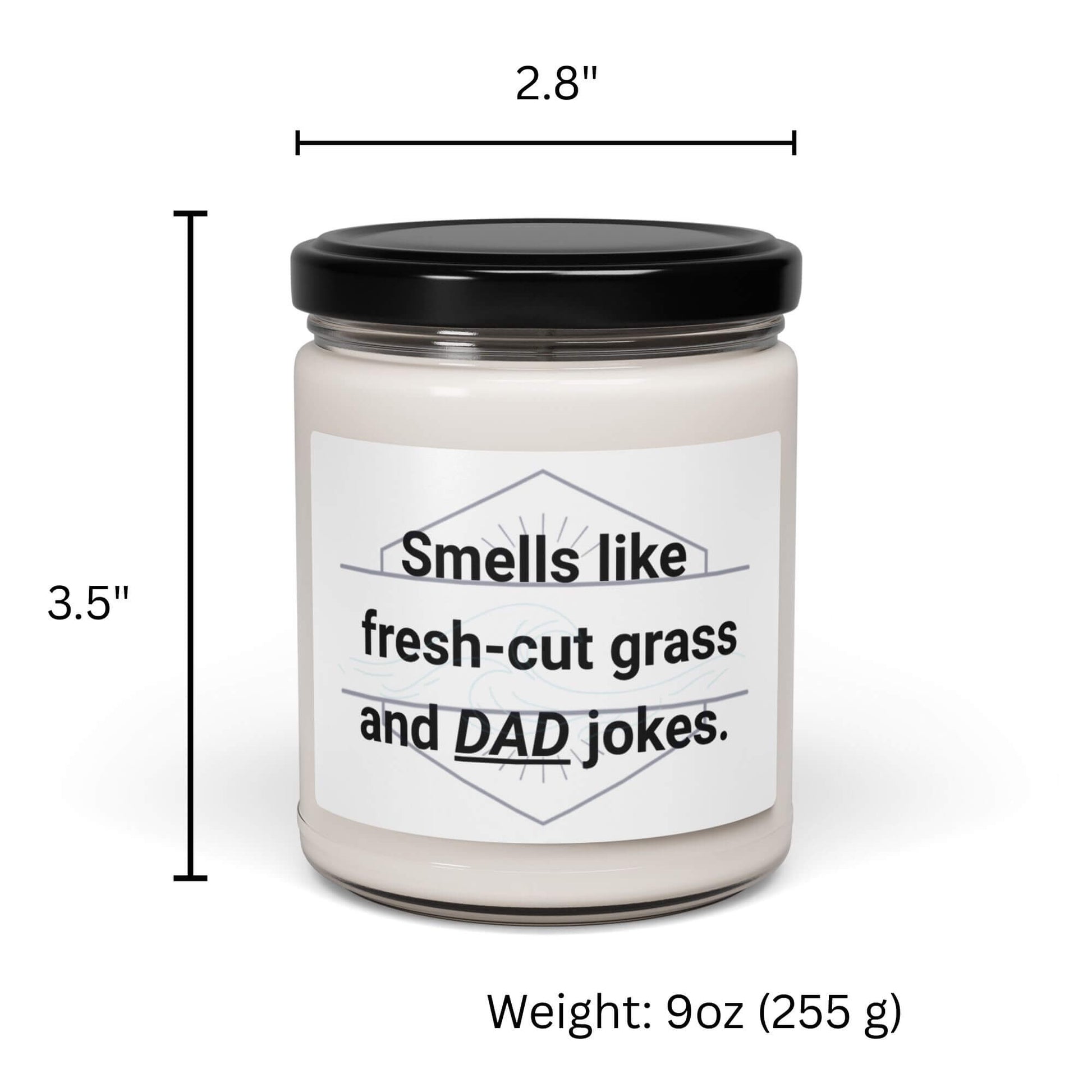 9oz glass jar candle with "Smells like fresh-cut grass and DAD jokes" label, showing product dimensions.