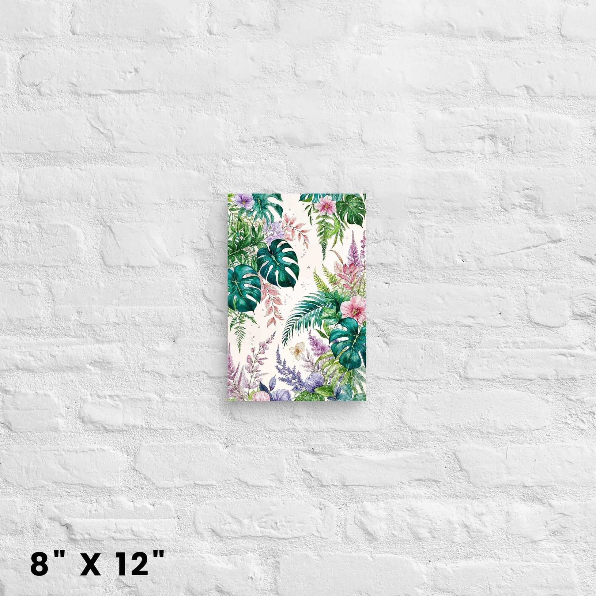 8"x12" canvas print showcasing a tropical botanical watercolor illustration, hanging on a white brick wall.
