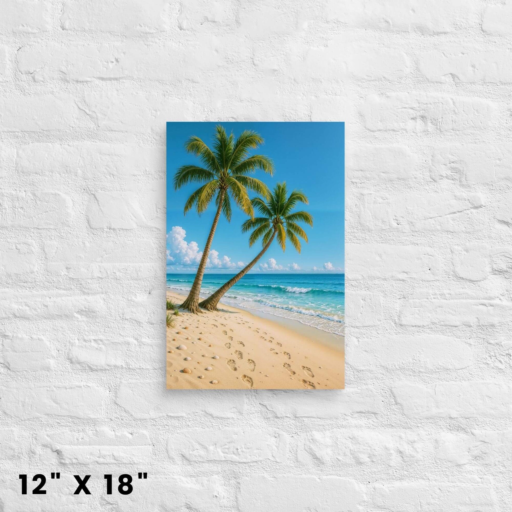 12 × 18-inch vibrant tropical beach canvas accent featuring footprints in soft sand on a white-brick wall.