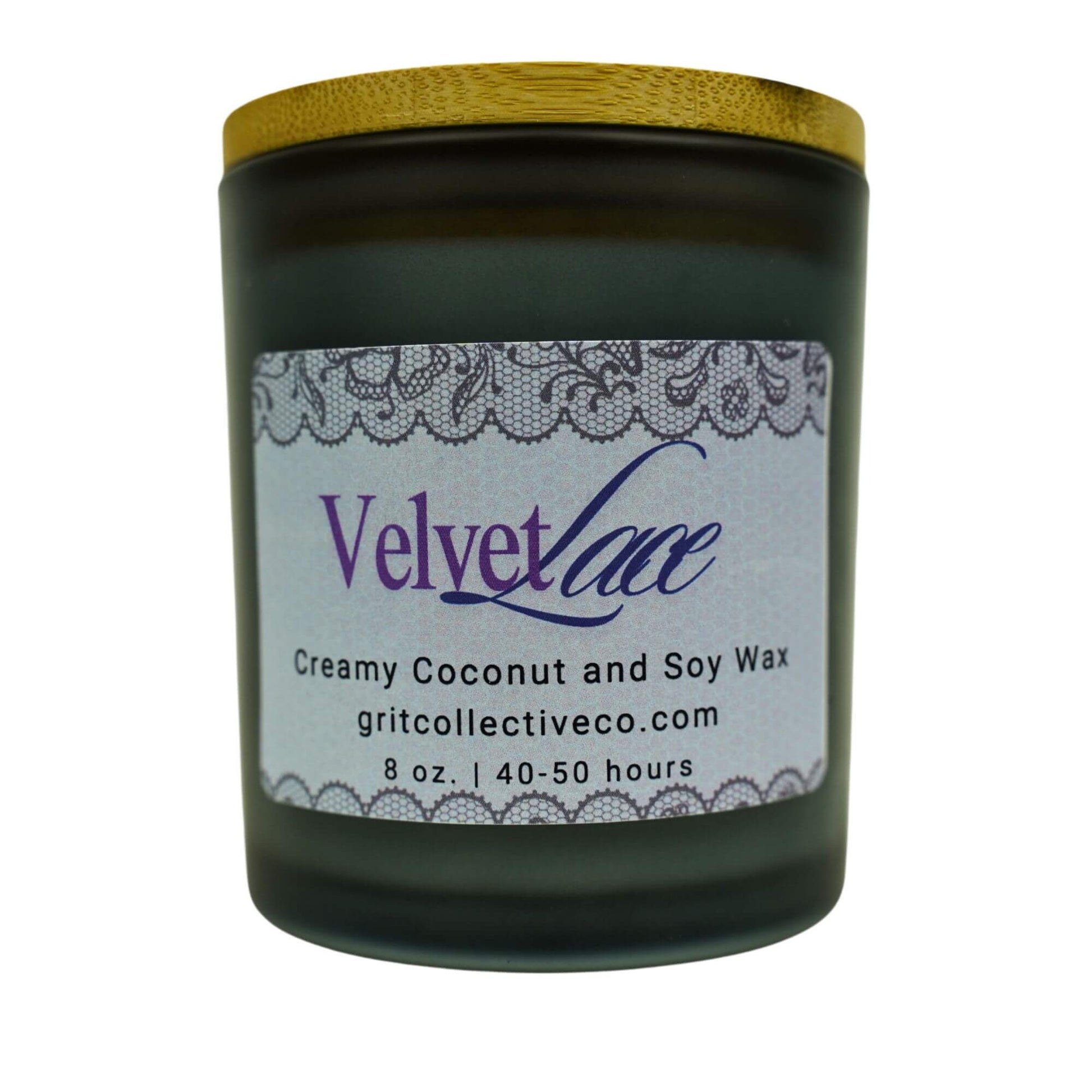 Velvet Lace" creamy coconut and soy wax candle by Grit Collective Co. with a purple text and lace pattern label and wooden lid.