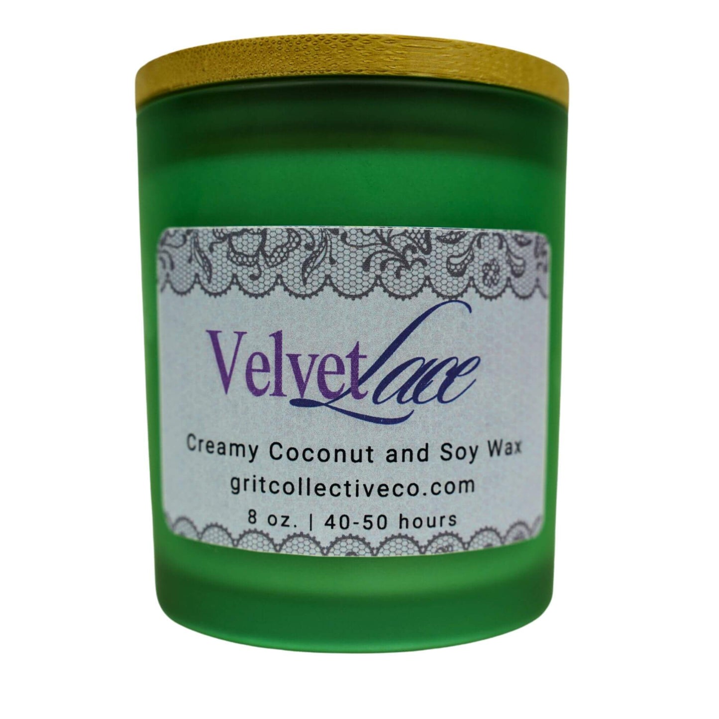Velvet Lace" creamy coconut and soy wax candle by Grit Collective Co. in a green glass jar with a lace-themed label and bamboo lid.