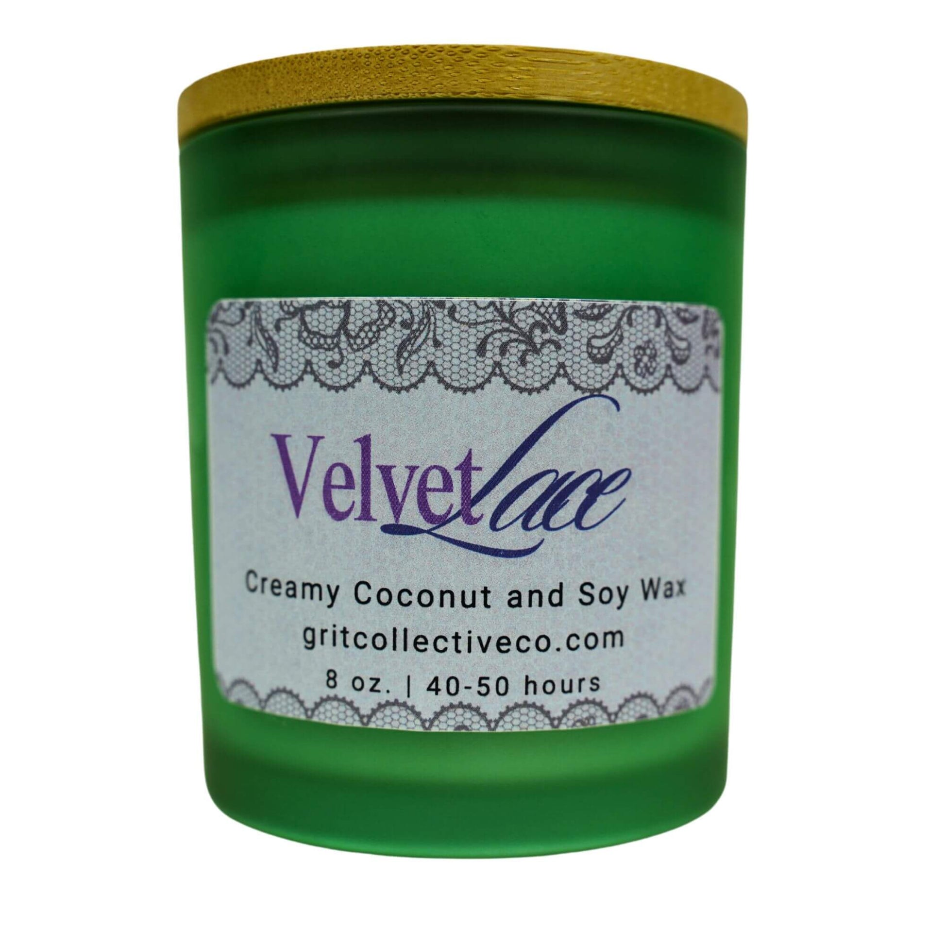 Velvet Lace" creamy coconut and soy wax candle by Grit Collective Co. in a green glass jar with a lace-themed label and bamboo lid.