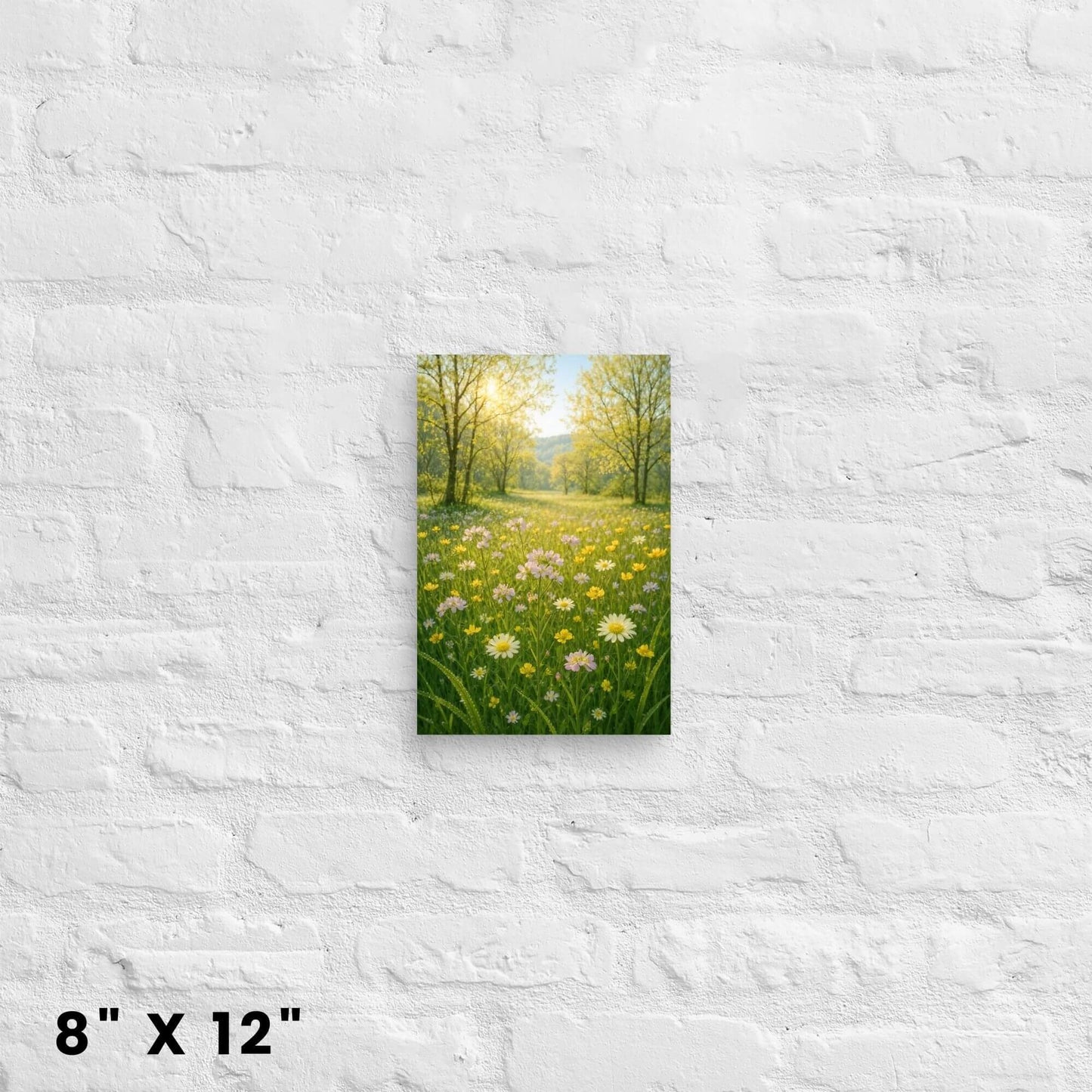 8"x12" canvas print showcasing a cheerful wildflower field scene under a bright sky,
hanging on a white brick wall.