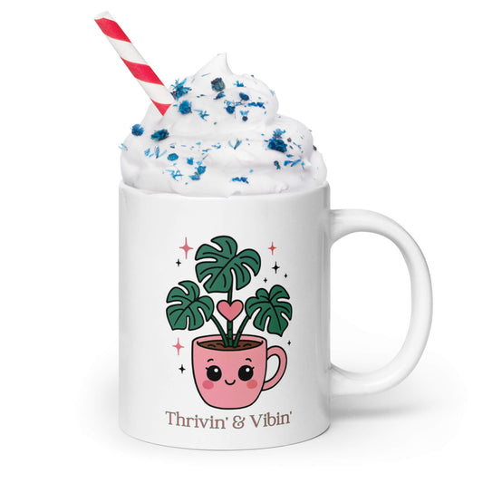 Grit Collective Kawaii Thriving Plant Pal design printed on a 20oz white glossy ceramic coffee mug, featured in an ice cream themed scene.
