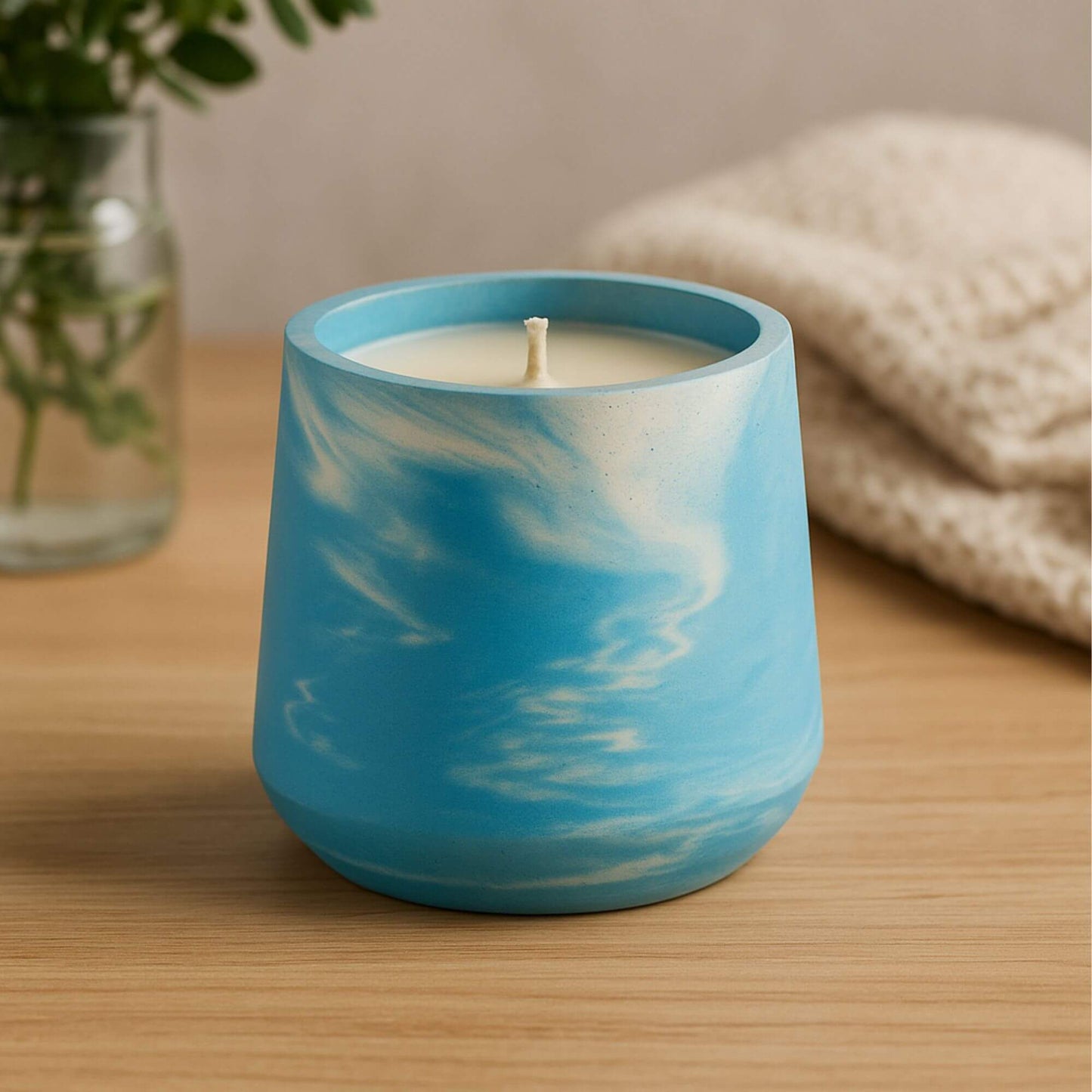 Dark swirl marble Sea Stone Concrete Candle by Grit Collective, a 6oz hand-poured coconut-soy wax candle in a unique artisan vessel.